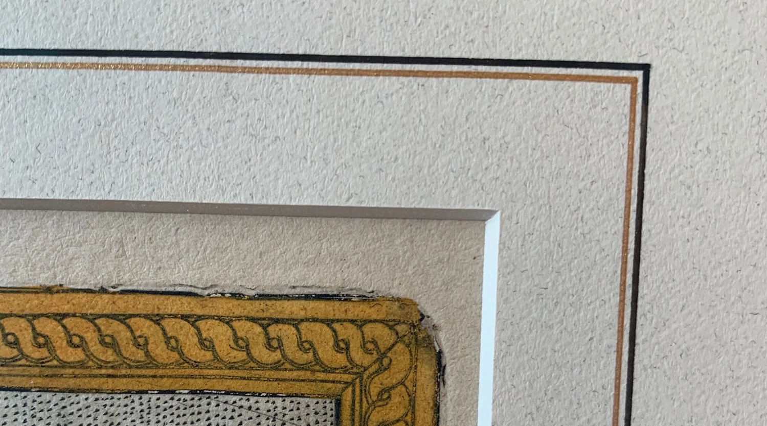 Historic work on paper with hand-drawn black and gold mat lines